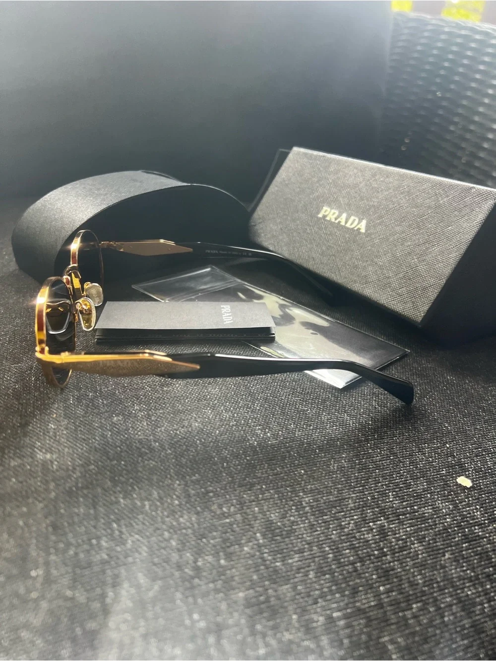 Prada Gold Frame Black Lens Round Sunglasses
